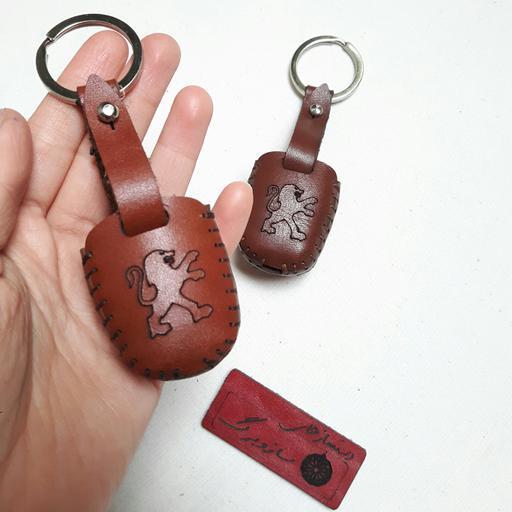 جاسوئیچی چرمی پژو 206 و 207 (کاور ریموت سوئیچ پژو) روکش چرم طبیعی کاور سوئیچ پژو 206 206SD و 207